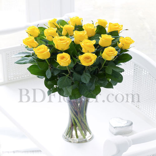 Send 18 pcs imported yellow roses in vase to Bangladesh
