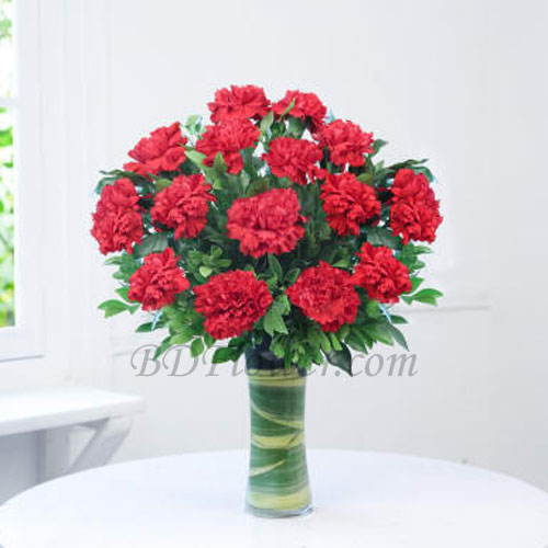 Send 15 pcs red carnations in vase to Bangladesh